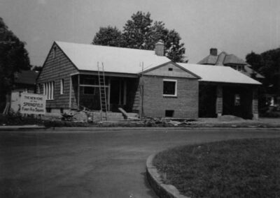 Curved street in front of Squad house under construction